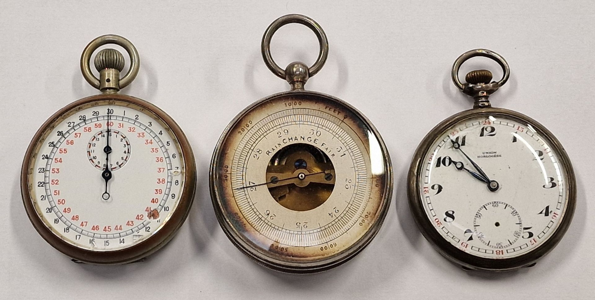 A silver pocket watch, military stopwatch and pocket barometer (C1)