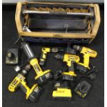 Large collection of assorted DeWalt power tools in tool bag (H1).