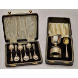 Cased silver Christening set together with a cased set of six silver teaspoons. (C2)