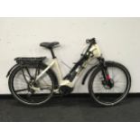A white Haibike Electric cycle. 10 gears 17” frame size 28” wheel size. (42)
