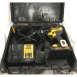 A Dewalt lithium drill in case.