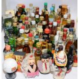 A very large collection of vintage spirits miniatures including collectable examples. All seals