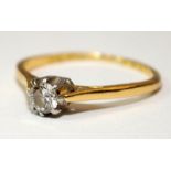 18ct gold approx .2ct diamond solitaire ring size Q. (29)