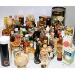 A very large collection of vintage spirits miniatures including collectable examples. All seals