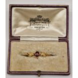 Antique 9ct gold brooch in antique box.