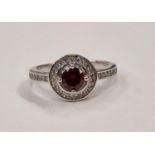 A 925 silver halo style ring with red stone to centre Size L