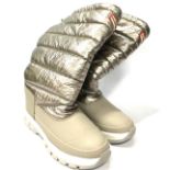 A pair of Hunter snow boots.