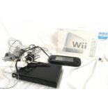 A box of Nintendo consoles to include Wii