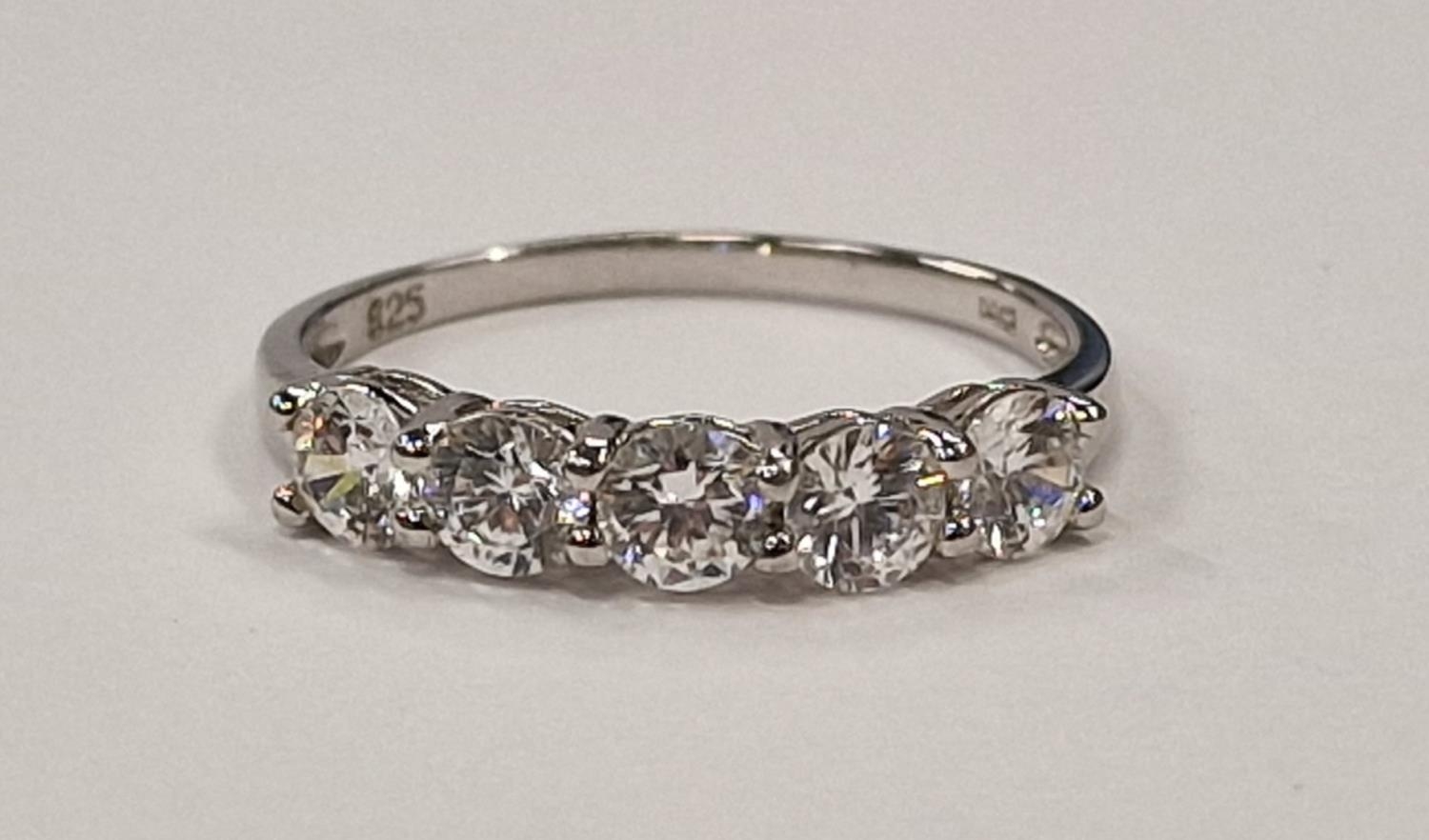 A sparkling 925 silver 5 stone CZ ring Size R (D1)