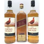 3 bottles of whisky. This lot has 2 bottles of Famouse Grouse and a bottle of Johnnie Walkers red