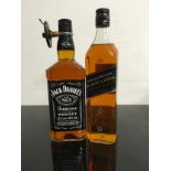 Jack Daniels 1litre together with 70cl Johnny Walker black label. (3)