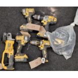 Collection of dewalt cordless tools and a charger. (50, 54, 55, 56, 57,62)