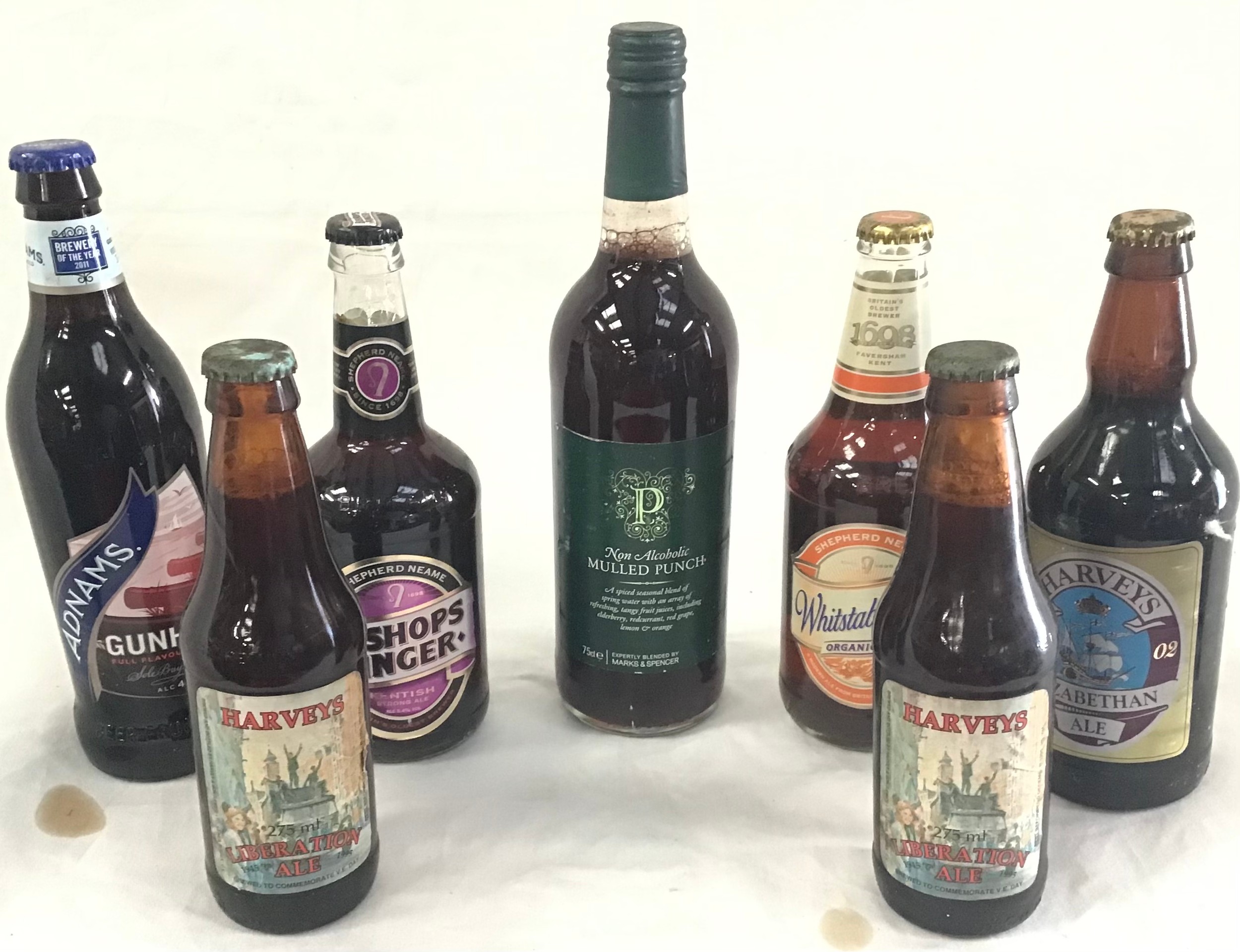 Vintage bottles of alcohol. 7 bottles in total to include mulled punch, ales and beers.