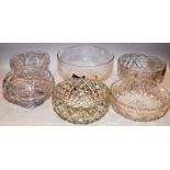 A collection of large cut glass lead crystal fruit bowls, the largest being 25cms across x 14cms