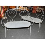 Pair of metal two seater garden benches. Seat height 43cms, 106cms across
