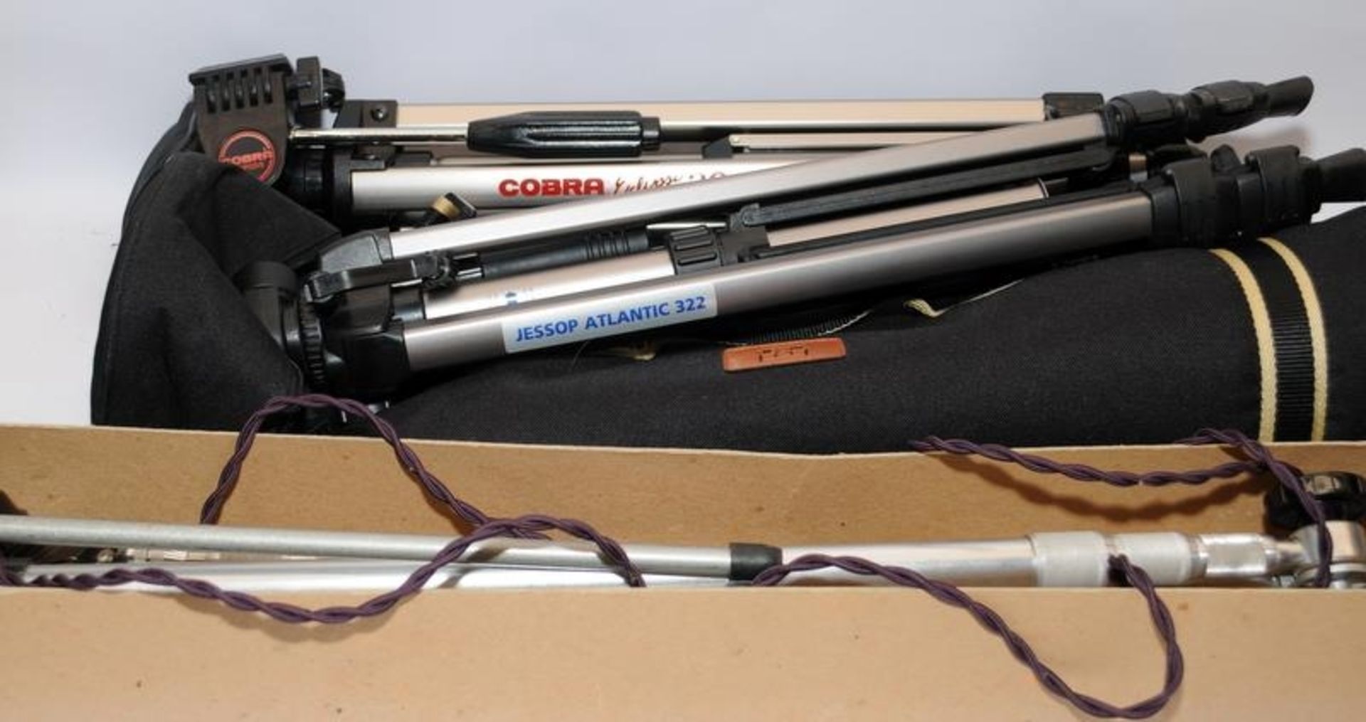 Vintage photography: Two camera tripods and a Photax lighting rig