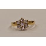 Diamond daisy ring set in 5g, 18ct gold ring Size O