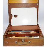 Vintage artists travelling paint box with contents. 44cms across