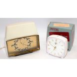 Two vintage alarm clocks including a boxed Smiths alarm clock and a Metamec bedside clock with lamp