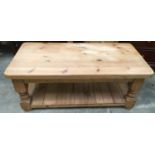 Solid pine coffee table of rectangular form with rounded corners 121x50x59cm.