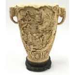 Carved resin vintage oriental vase on wooden base 30cm tall.
