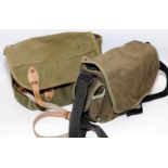 Two vintage canvas fishing shoulder bags containing a number of lures and other tackle