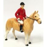 Palomino horse and rider 21cm tall possibly Beswick.
