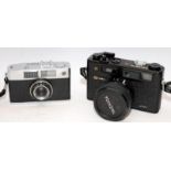 2 x vintage 35mm cameras to include Yashica Electro 35 rangefinder and a Ricoh Caddy