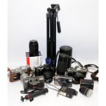 Collection of vintage cameras and accessories to include Canon EOS 5000 with lenses, Minolta XG2 and