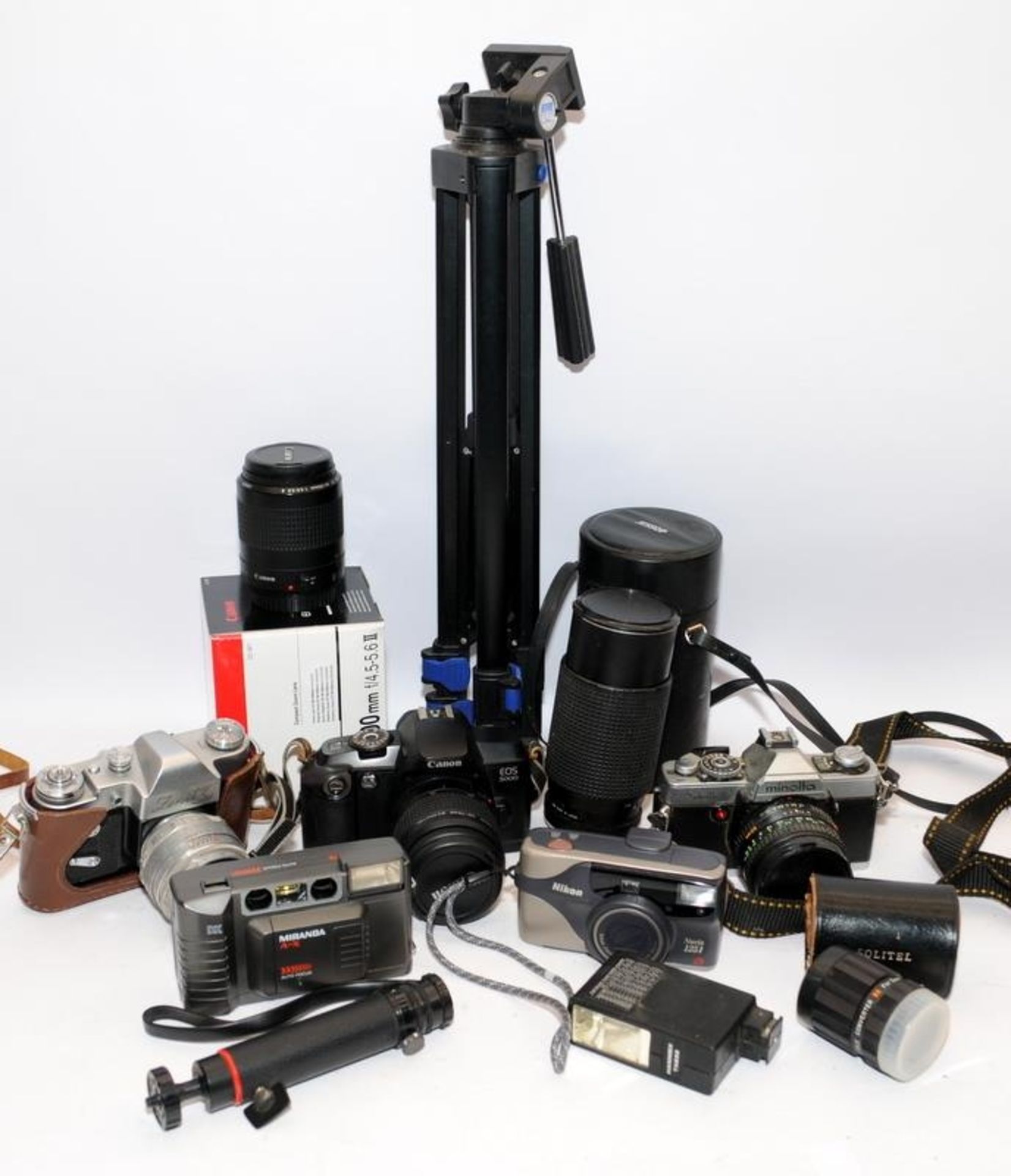 Collection of vintage cameras and accessories to include Canon EOS 5000 with lenses, Minolta XG2 and