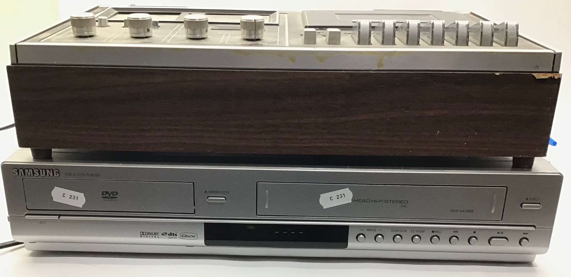 National Panasonic cassette deck and a Samsung VHS/DVD player.