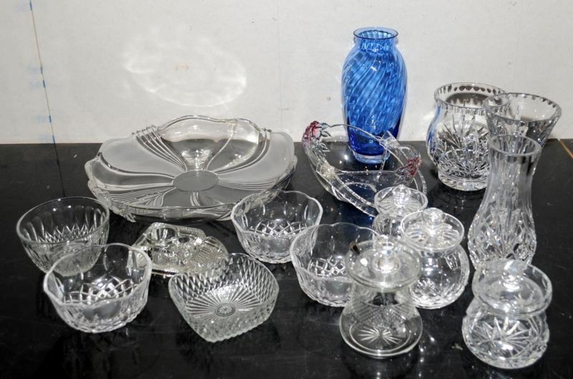 Large collection of cut glass lead crystal, including lidded jars, vases, bowls and an inkwell. 16