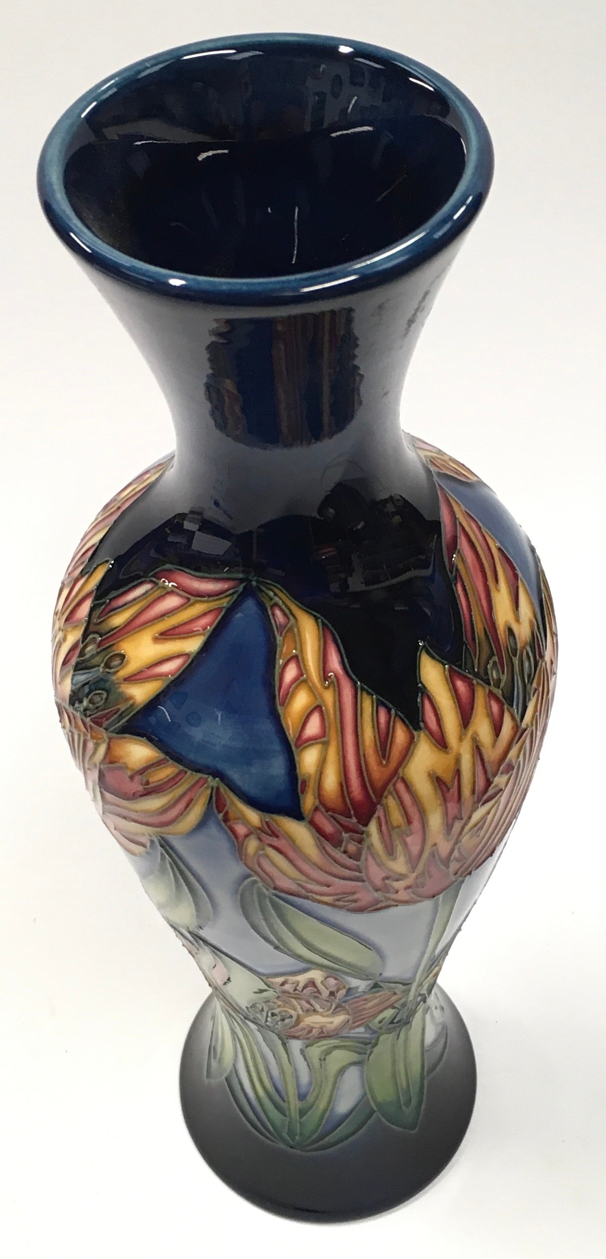 Moorcroft tall navy vase decorated with orange flowers 2001. 31cm tall. Signed and marked to base. - Image 3 of 4