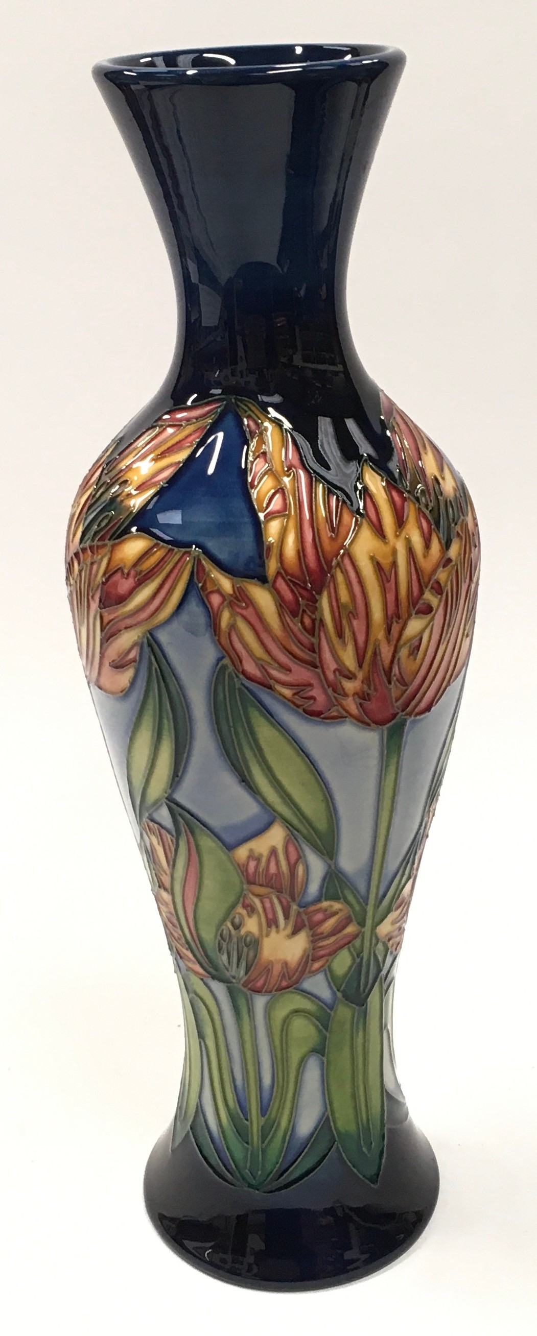 Moorcroft tall navy vase decorated with orange flowers 2001. 31cm tall. Signed and marked to base. - Image 2 of 4