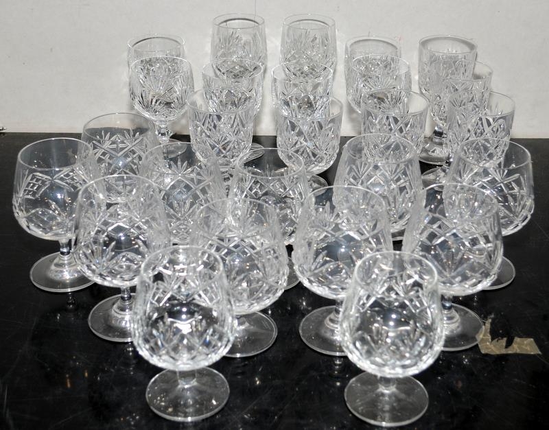 Large collection of cut glass lead crystal dessert wine and brandy glasses. Total 26 in lot