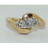 9ct gold ladies diamond 3 stone twist ring with diamonds set to shoulders hall marked in ring as 1