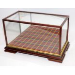 Vintage mahogany and glass display case with mirrored back in rectangular form 35cms across x