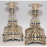 Pair of ornate squat .925 silver candlesticks by Danish silversmiths Monster Beskyttet. 19cms tall