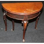 Georgian Demi-lune table converts to occasional table with storage under fixed leaf. 69cms tall