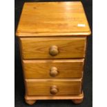 Three drawer pine bedside cabinet 59cms x 41cms x 41cms