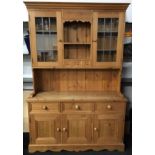 Solid pine welsh dresser with two glazed doors over three drawer/three cupboard base 202cms tall x
