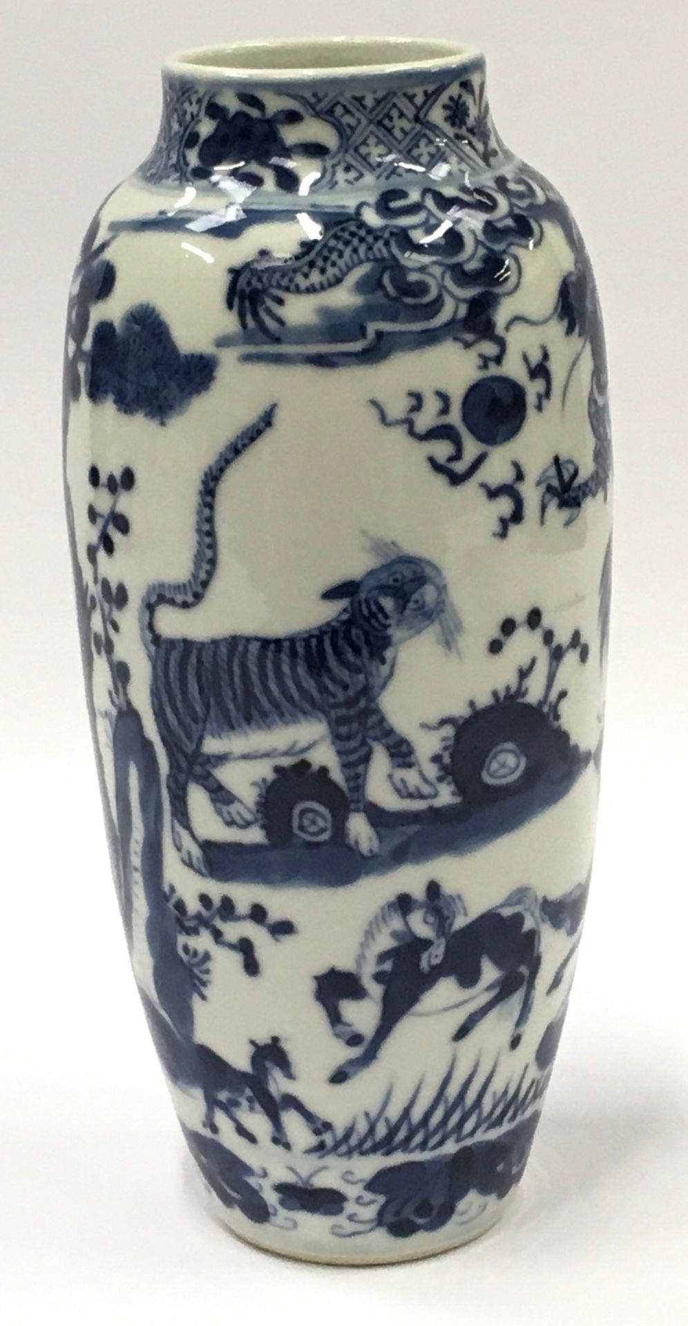 Possible 19th Century Chinese oriental blue and white porcelain vase decorated with images of