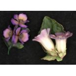 Two purple flower ceramic ornaments by Fabar and Tom Quec