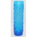 Large cylindrical bark effect blue glass vase in the style of Whitefriars. 31cms tall