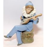 Nao by Lladro figure of a girl playing a lute. 19cms tall