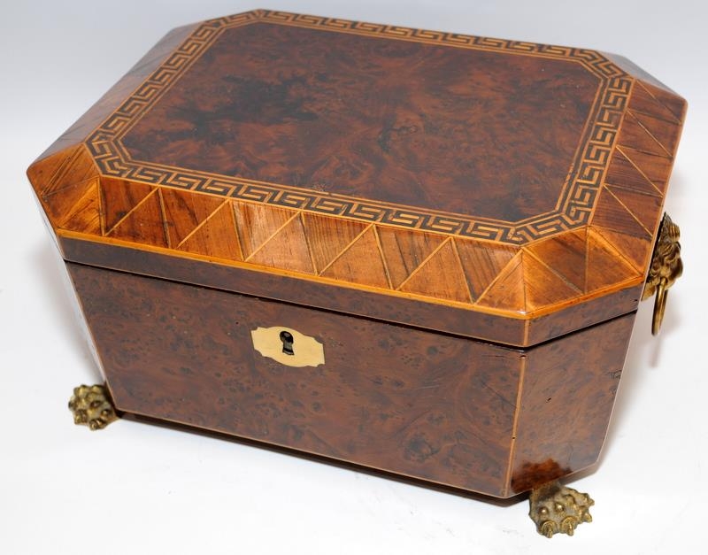 Attractive Regency letter/document box with brass feet and lions head handles. Interior lined with