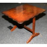 Antique small tilt top occasional table with scalloped edge and flame mahogany veneer. 48cms tall