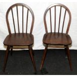 Pair of mid-century Ercol Windsor chairs, seat height 44cms. One full and one partial label