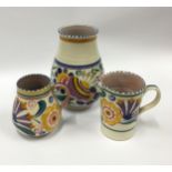 Poole Pottery shape 266 BO pattern vase 5.8" high, together with a shape 322 FN pattern jug 3.8"