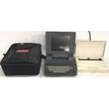 TOSHIBA T3100e, together with a canon bubble jet printer model BJ10e and portable carry case.